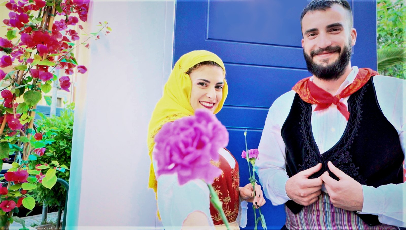 Costumed bride-and-groom characters at a celebration