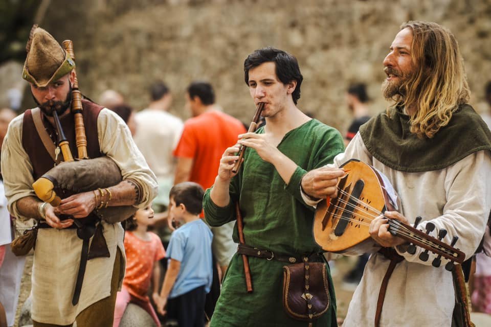 Musicians playing period-inspired instruments