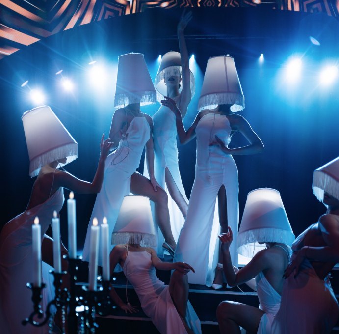 Illuminated lampshade-costume performers