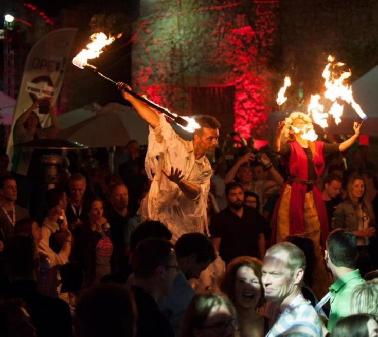 Stilt fire performers entertaining an audience