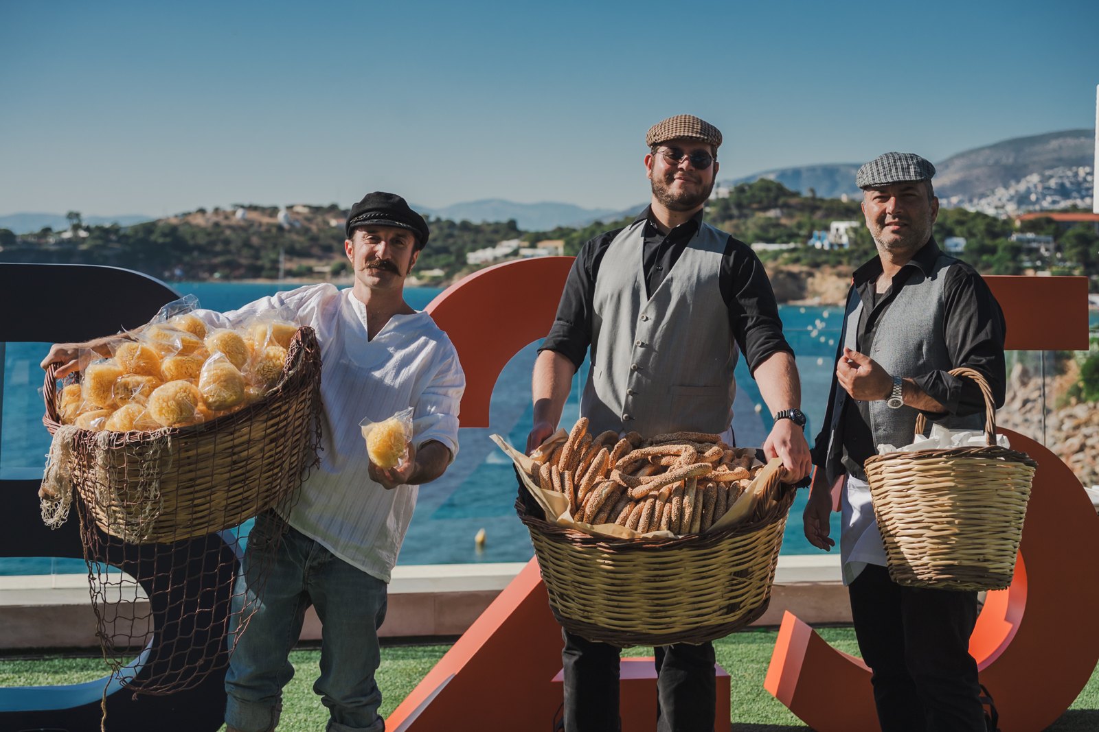 Traditional Greek street vendors welcoming guests