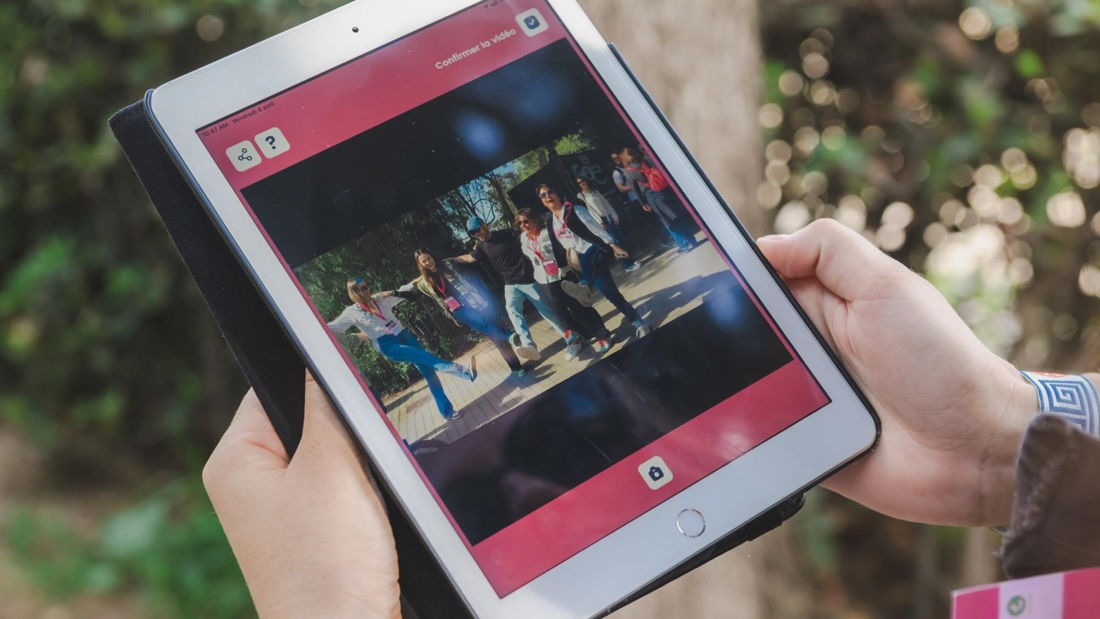 Participant using an iPad during the city discovery game