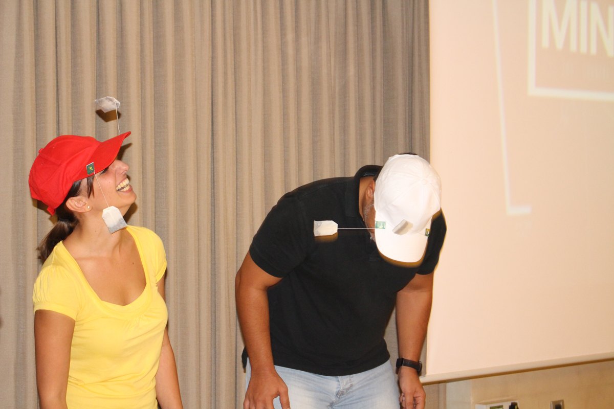 Participants attempting a one-minute team challenge