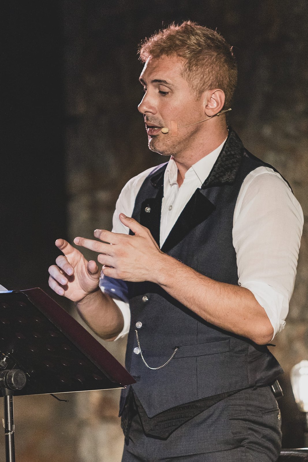 Event host speaking into a microphone