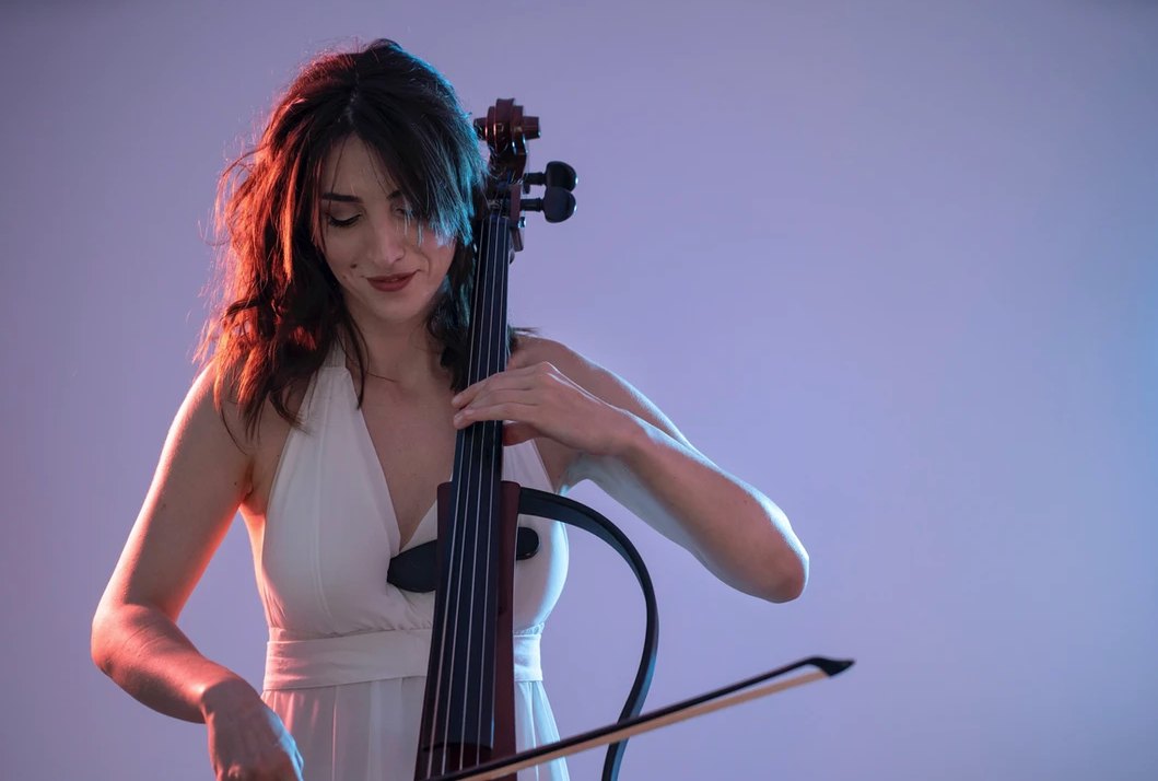 Electric cellist performing