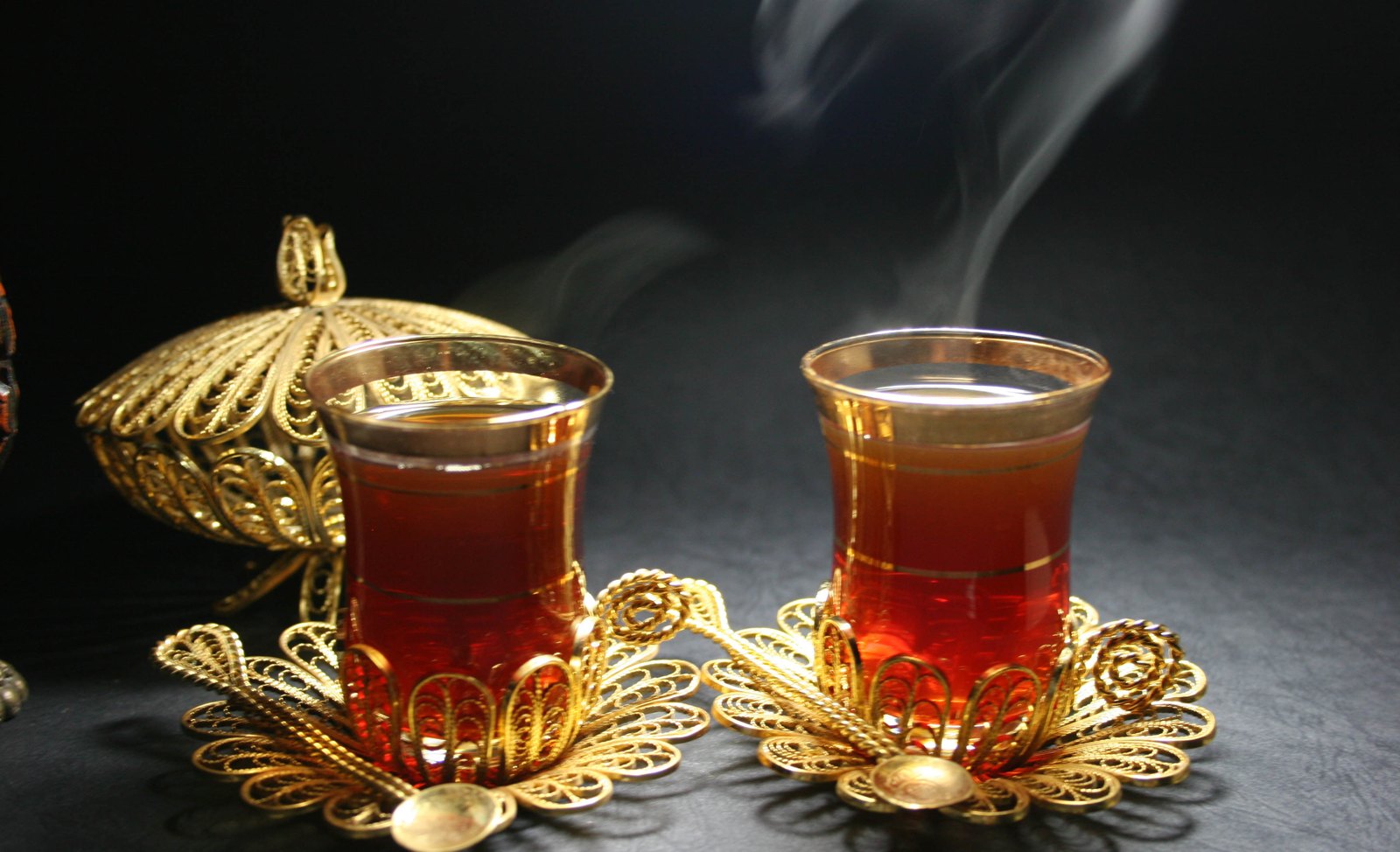 Glasses of tea in an ornate serving arrangement