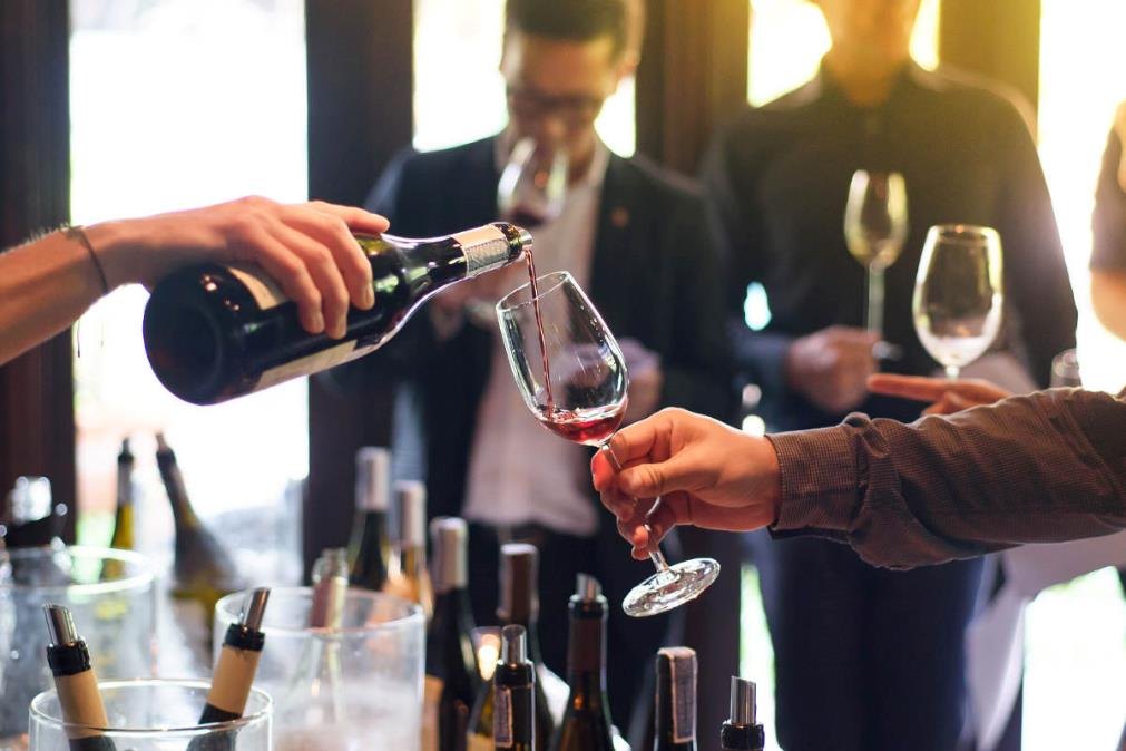 Wine being poured into a tasting glass